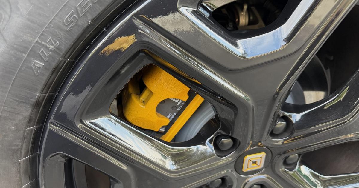 An EV alloy wheel, a Rivian, photographed after cosmetic repair